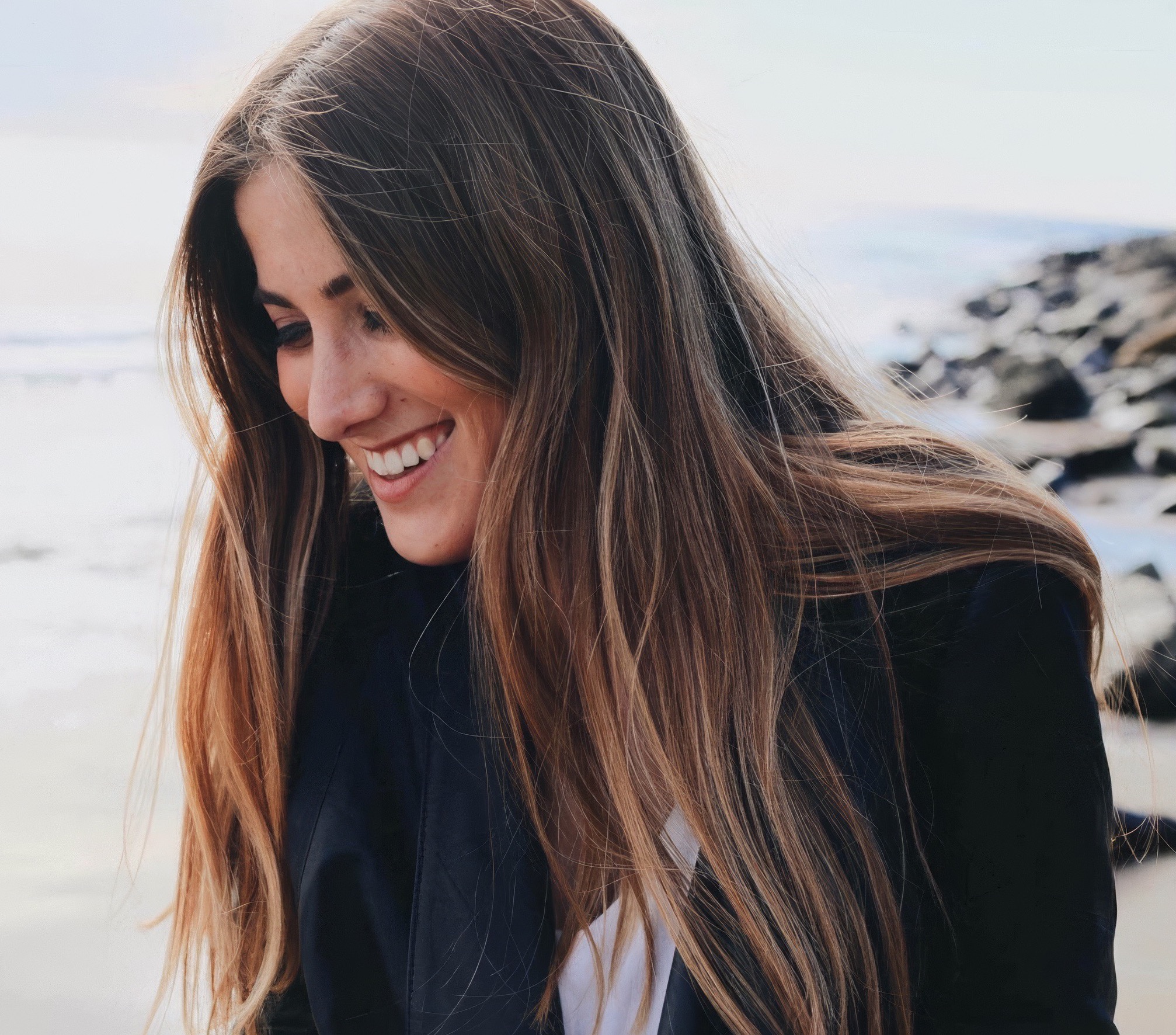 Woman smiling on a beach